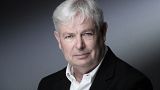 British novelist and writer Jonathan Coe poses during a photo session in Paris, on July 13, 2021. 