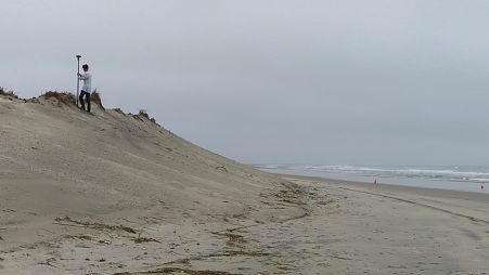 Survey work by a crew from Stockton University measures the contours of an eroded beach in North Wildwood.
