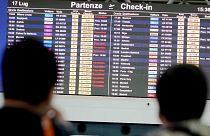 A screen displaying canceled flights is seen in Rome's Leonardo Da Vinci international airport, Sunday, July 17, 2022. 