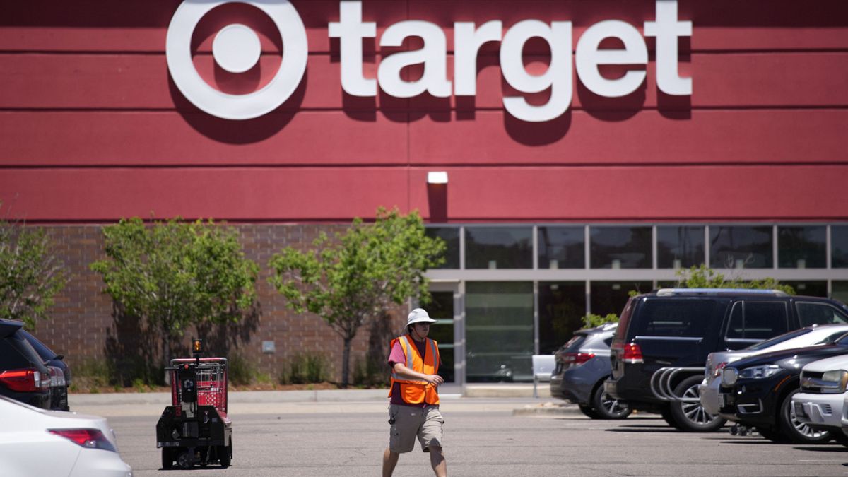 An employee walks outside a Target store in Colorado, United States.