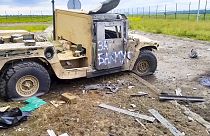 A damaged armored military vehicle is seen after fighting in Russia's western Belgorod region on Tuesday, May 23, 2023.