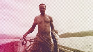 Fisherman Ayafor handles a barracuda he caught in the Atlantic near Limbe, Cameroon, April 2022