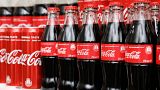 Bottles and cans of Coca-Cola