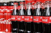 Bottles and cans of Coca-Cola