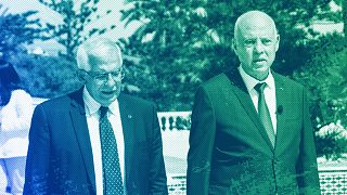 Tunisian President Kais Saied, right, walks with European Union foreign policy chief Josep Borrell in Tunis, September 2021