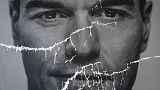 A partially damaged poster of Spanish Prime Minister and Socialist Party candidate Pedro Sanchez.