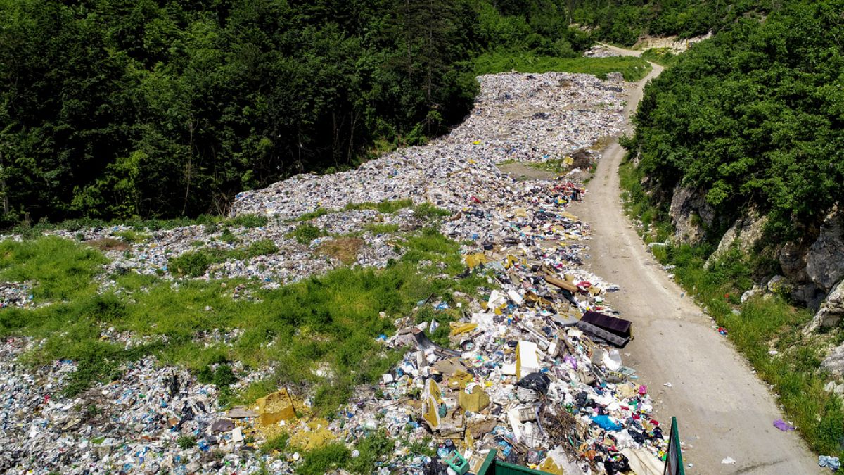 Garbage is dumped on the banks of the Drina river near the eastern Bosnian town of Visegrad, Bosnia, Thursday, May 25, 2023