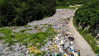 Garbage is dumped on the banks of the Drina river near the eastern Bosnian town of Visegrad, Bosnia, Thursday, May 25, 2023