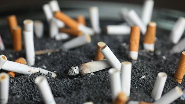 Cigarette butts sit in an ashtray on March 28, 2019, in New York