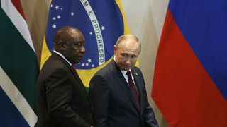 South Africa's President Cyril Ramaphosa and Russia's President Vladimir Putin arriving at a BRICS even in Brazil. 14 November 2019