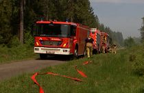 Firemen at the scene in Fagnes, Belgium 