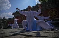 Taoists perform Wudang Tai Chi at Wudangshan Mountain in central China's Hubei Province