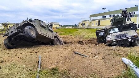 In this image taken from Russian Defence Ministry video, damaged military vehicles are seen in Russia's western Belgorod region on Tuesday, May 23, 2023.
