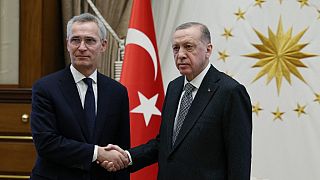 FILE - February 16, 2023 shows Turkey's President Recep Tayyip Erdogan shaking hands with NATO Secretary General Jens Stoltenberg