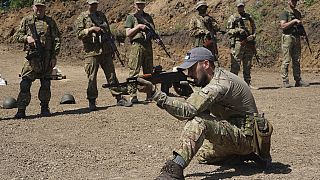 Servicemen of the newly created National Guard unit train in the Kharkiv region, Ukraine,