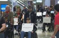 Procession of WWII veterans departing for Normandy  commemoration ceremony
