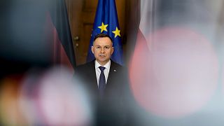 Polish President Andrzej Duda defended the controversial law but offered changes to address the growing criticism.