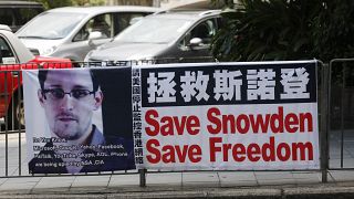 A banner supporting Edward Snowden, a former CIA employee who leaked top-secret documents about sweeping U.S. surveillance programs in Hong Kong
