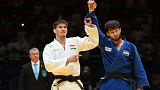 Somon Makhmadbekov and Shodmon Rizoev following the -81kg final in Dushanbe