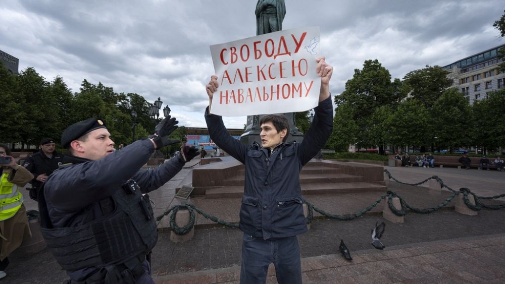 Supporters of Russian opposition figure Alexei Navalny hold protests