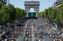 The prestigious Champs-Elysees Avenue hosting participants, as they attempt to beat the record of the "World's Biggest Dictation" in Paris