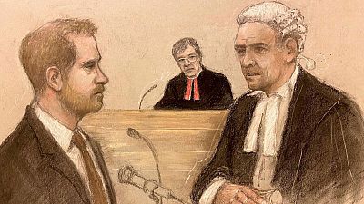 Prince Harry being cross examined by Andrew Green KC, as depicted by court artist Elizabeth Cook.