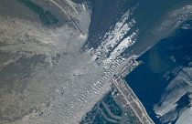 This satellite image provided by Planet Labs PBC shows an overview of the damage on the Kakhovka dam in southern Ukraine on Tuesday, June 6, 2023.