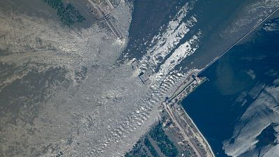 This satellite image provided by Planet Labs PBC shows an overview of the damage on the Kakhovka dam in southern Ukraine on Tuesday, June 6, 2023.