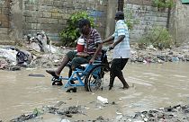   شارع غمرته المياه بعد هطول أمطار غزيرة، في بورت أو برنس، هايتي، 3 يونيو 2023