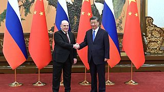 رئيس الوزراء الروسي ميخائيل ميشوستين، يسار، والرئيس الصيني شي جين بينغ، بكين، الصين، 24 مايو 2023