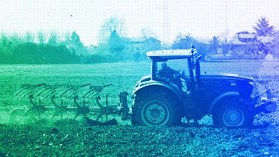 A farmer plows a field with his tractor in Cisliano, March 2022