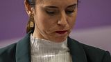 Spain's Equality Minister Irene Montero looks down during a press conference.