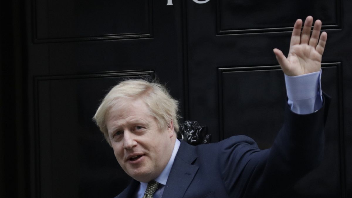 Britain's Prime Minister Boris Johnson returns to 10 Downing Street after meeting with Queen Elizabeth II at Buckingham Palace, London, on Friday, Dec. 13, 2019.