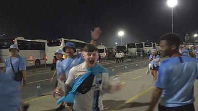  Manchester City fans leave the stadium.