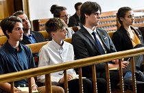 Young plaintiffs listen to arguments during a status hearing on 12 May 2021 in Helena, Montana.