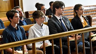 Young plaintiffs listen to arguments during a status hearing on 12 May 2021 in Helena, Montana.