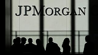 FILE - In this Oct. 21, 2013 file photo, the JPMorgan Chase & Co. logo is displayed at their headquarters in New York.