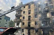 A fire after missiles hit a multi-story apartment building in Kryvyi Rih, Ukraine, Tuesday, June 13, 2023.