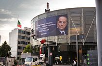 A giant poster at the Mediaset media conglomerate headquarters in Cologno Monzese, near Milan after former Italian Premier Silvio Berlusconi died in Milan, June 12, 2023.