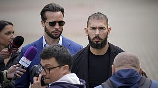 Andrew Tate and his brother Tristan leave the Bucharest Tribunal, Romania,  21 April 2023