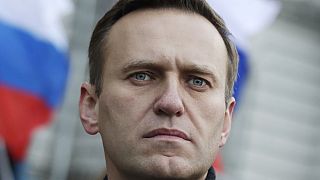 Russian opposition activist Alexei Navalny takes part in a march in memory of opposition leader Boris Nemtsov in Moscow, Russia, on Saturday, Feb. 29, 2020.