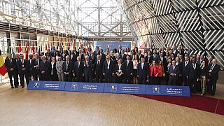 Participants pose for a group photo during the meeting 'Supporting the future of Syria and the region' at the European Council building in Brussels, Thursday, June 15, 2023.