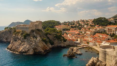 The coastal city of Dubrovnik crowns a rocky plateau that juts out into the Adriatic sea. 