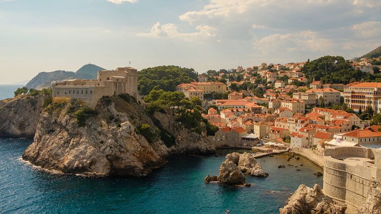 The coastal city of Dubrovnik crowns a rocky plateau that juts out into the Adriatic sea. 