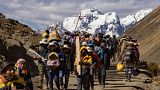 Devotees climb up the skirts of the Sinakara Mount to reach the shrine of the Lord of Qoyllur Rit'i