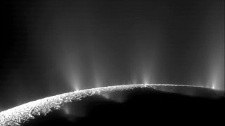 This photo shows plumes of water ice and vapor from the south polar region of Saturn's moon Enceladus