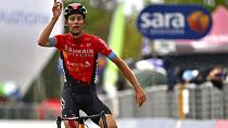 FILE - Switzerland's Gino Mader wining sixth stage of Giro d'Italia cycling race, from Grotte di Frasassi to Ascoli Piceno, May 13, 2021