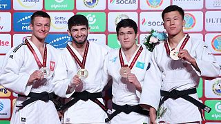 Победитель Махмадбек Махмадбеков (второй слева) и призеры турнира в Астане, весовая категория до 73 кг.