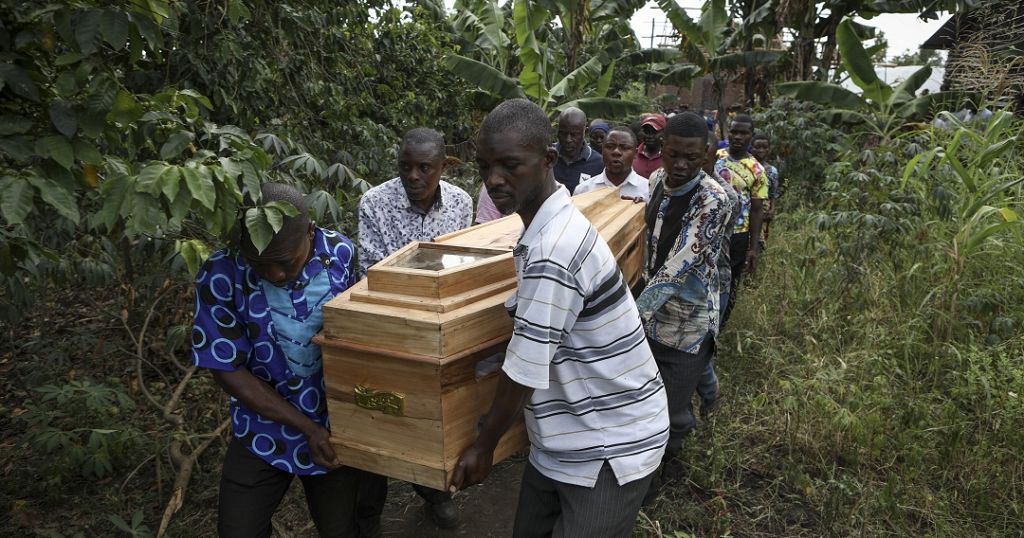 Uganda: Grieving relatives bury their dead after school attack