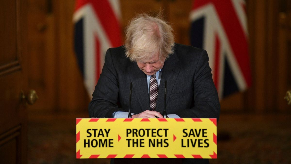Boris Johnson as Prime Minister at a COVID-19 news conference. A report found he had misled Parliament over parties during lockdown. 